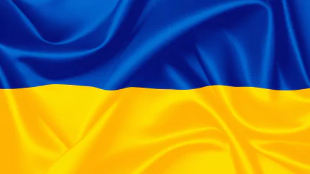 4K Ultra HD desktop wallpaper featuring the blue and yellow flag of Ukraine with a smooth, silky texture.