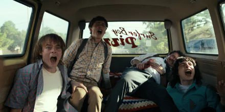 Stranger Things TV scene: four kids screaming inside a van, tense retro atmosphere — 2K Quad HD PC desktop wallpaper background.