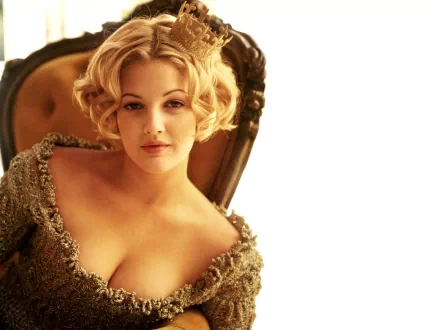 A stunning HD wallpaper featuring Drew Barrymore, showcasing her glamorous pose and elegant style, set against a light background for a captivating desktop display.