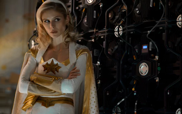Starlight from TV show The Boys (2019) in white-and-gold hero costume, arms crossed against a dark wall of cables and equipment — 2K Quad HD PC desktop wallpaper/background