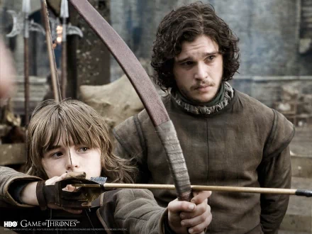 HD desktop wallpaper featuring Isaac Hempstead-Wright as Bran Stark and Kit Harington as Jon Snow from the TV show Game of Thrones.