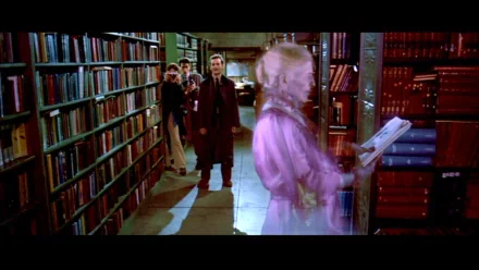 HD PC desktop wallpaper from the movie Ghostbusters showing ghost hunters in a library with a translucent ghost reading a book.