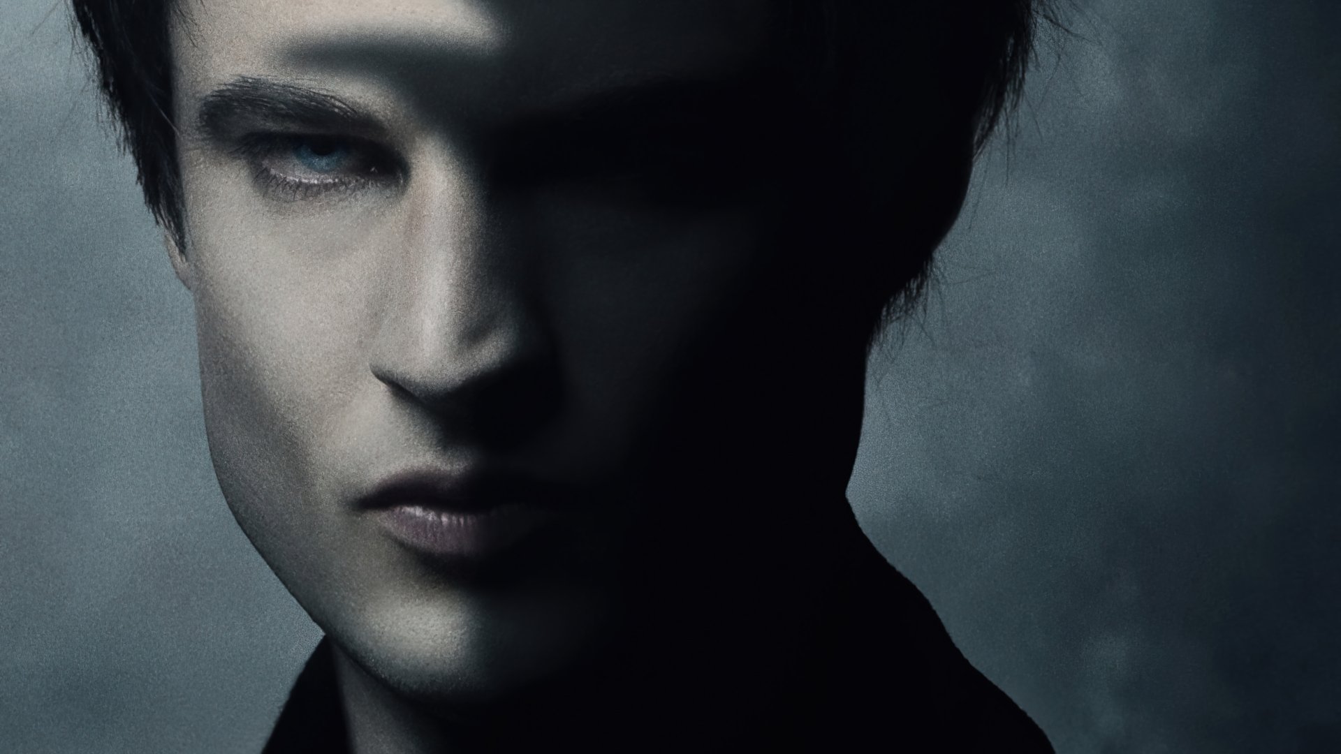 Close-up 4K Ultra HD PC desktop wallpaper from The Sandman TV show: pale, brooding figure with milky eyes half-hidden in shadow against a smoky, moody backdrop.