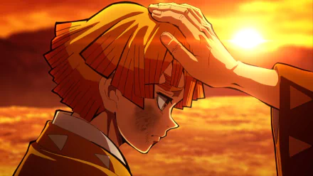 Zenitsu Agatsuma from Demon Slayer: Kimetsu no Yaiba stands against a vivid sunset, captured in this HD anime desktop wallpaper.