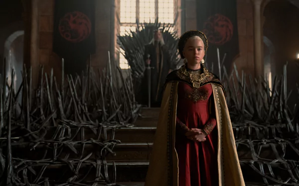 HD desktop wallpaper featuring Milly Alcock as Rhaenyra Targaryen from the TV show House of the Dragon, standing in the throne room before the Iron Throne.