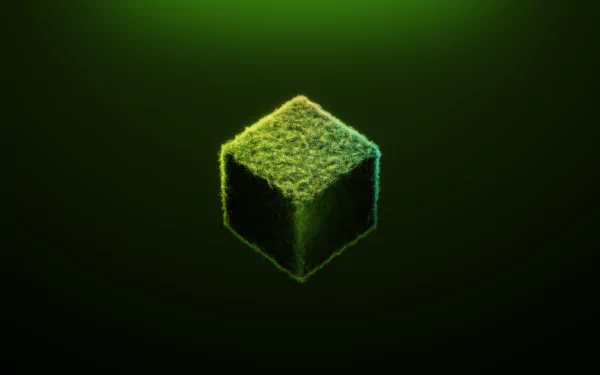 HD desktop wallpaper featuring a glowing, grass-covered cube from the video game Minecraft against a dark green background.