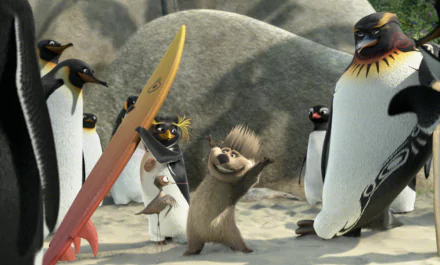 HD PC desktop wallpaper featuring anthropomorphic penguins and a furry character from the movie Surf's Up, set on sandy terrain with large rocks in the background.