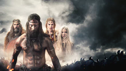 4K Ultra HD PC wallpaper: brooding Viking warriors and two Nordic women amid smoke, shields and stormy skies — poster-style scene from the movie The Northman.