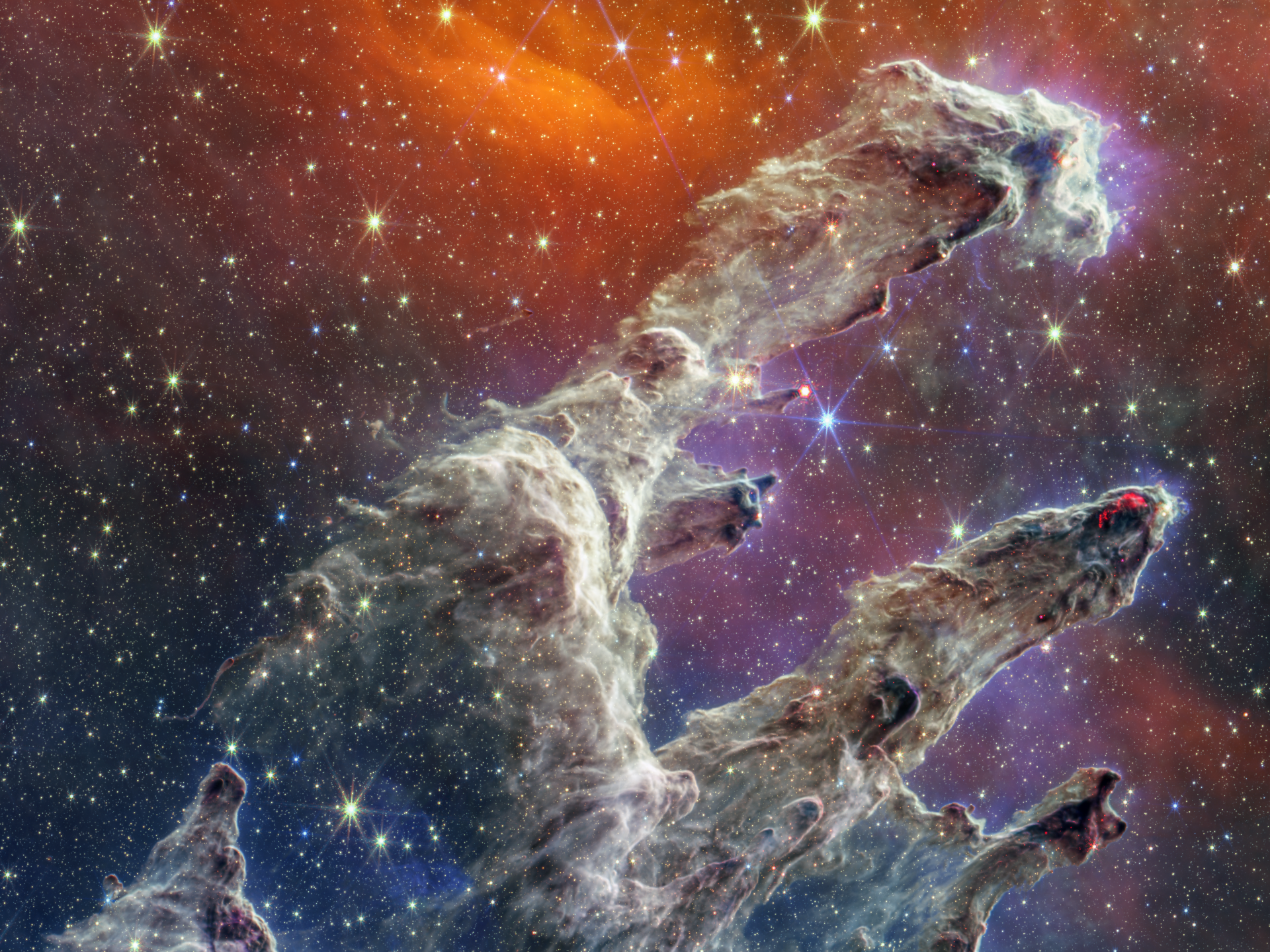 4K Ultra HD desktop wallpaper featuring a vibrant nebula captured by the James Webb Space Telescope, blending sci-fi elements with stunning cosmic detail.