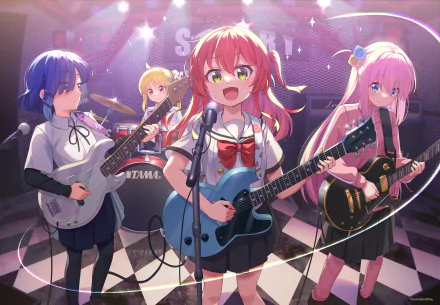 Anime HD wallpaper featuring Hitori Gotou, Ikuyo Kita, Nijika Ijichi, and Ryou Yamada from Bocchi the Rock!, performing energetically on stage with their instruments.