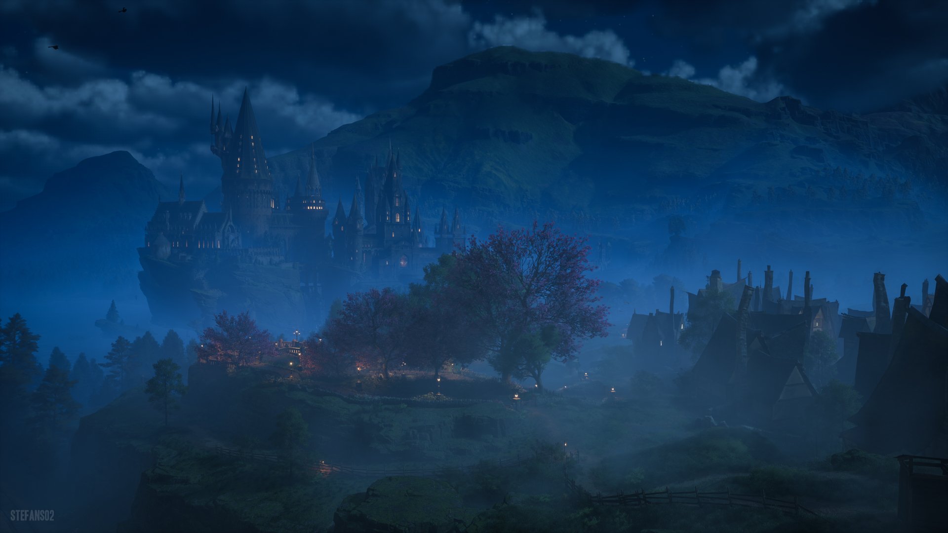 4K Ultra HD PC desktop wallpaper featuring a misty, atmospheric night scene from the video game Hogwarts Legacy with a distant view of Hogwarts castle.