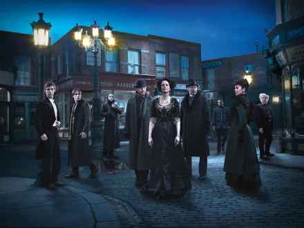 A HD desktop wallpaper and background featuring characters from the TV show Penny Dreadful, set against a dimly lit Victorian street with gas lamps illuminating the town.