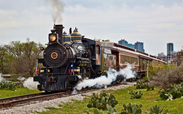 A scenic train voyage through stunning mountains on a captivating HD desktop wallpaper.