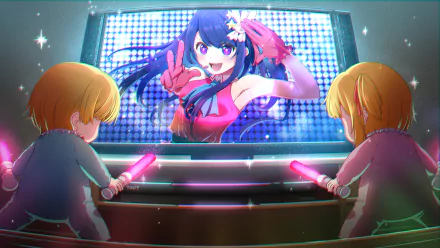 HD desktop wallpaper featuring Ruby Hoshino, Aquamarine Hoshino, and Ai Hoshino from the anime Oshi no Ko. The characters are engaged with a vibrant performance on a screen in the background.