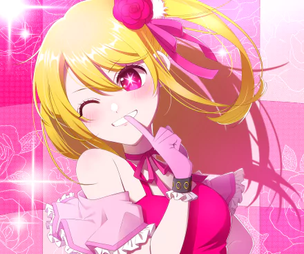 HD PC wallpaper of Ruby Hoshino (Oshi no Ko) — anime idol with blonde hair, pink outfit and bow, winking and finger to her lips against a sparkly pink background.