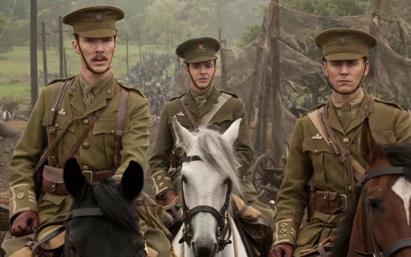 HD PC desktop wallpaper featuring three soldiers on horseback from the movie War Horse, set in a misty, wooded battlefield environment.