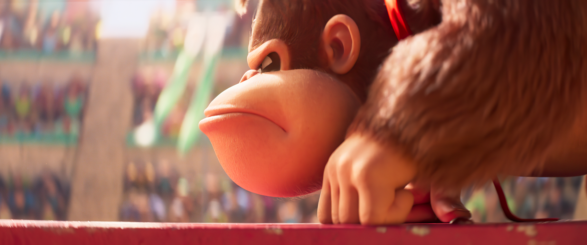 HD desktop wallpaper from the 2023 Super Mario Bros. movie, featuring a close-up of Donkey Kong looking pensive.