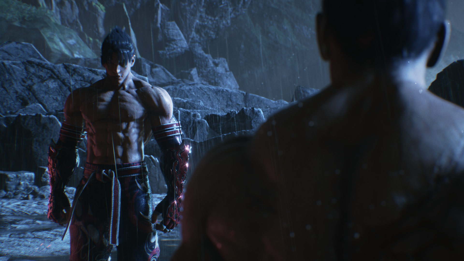 HD wallpaper of Jin Kazama from Tekken 8 with a dramatic pose in a cave environment, great for desktop background.