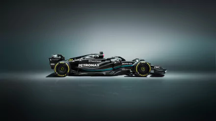 HD desktop wallpaper featuring a sleek Mercedes W14 Formula 1 car in a moody, illuminated setting.