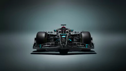 HD desktop wallpaper featuring a front view of the Mercedes W14 Formula 1 car, centered against a smooth gradient gray background.