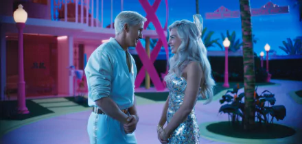 HD wallpaper from Barbie (2023) with Ryan Gosling and Margot Robbie in a neon-lit scene.