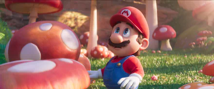 HD desktop wallpaper from the Super Mario Bros. (2023) movie featuring a 3D animated Mario in a mushroom-filled field.