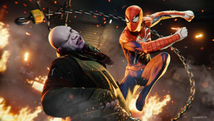 HD desktop wallpaper of Marvel's Spider-Man Remastered featuring Spider-Man in combat with a villain amid explosions.