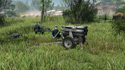 HD wallpaper featuring Men of War II gameplay with soldiers and artillery in a grassy battlefield.