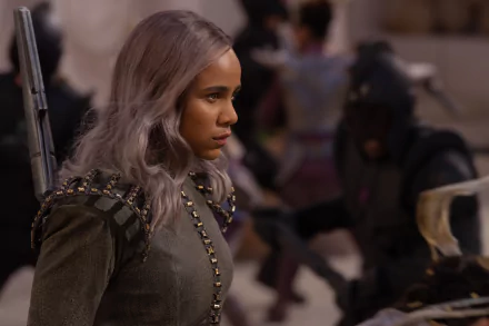 Zawe Ashton in a striking pose from the movie *The Marvels*, featured as a high-definition desktop wallpaper and background. A captivating glimpse into the film's action-packed aesthetic.