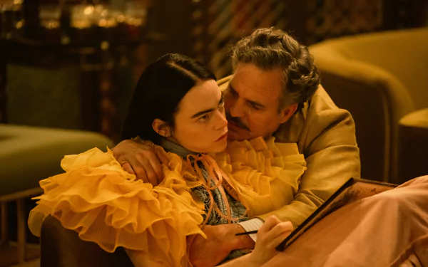 HD desktop wallpaper featuring a scene from the tagged production Poor Things, with two characters in an intimate and dramatic setting.