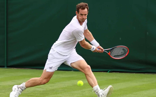 Tennis player in action at Wimbledon 2023 HD desktop wallpaper
