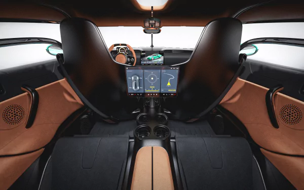 HD wallpaper of the interior of a Koenigsegg Gemera, featuring a sleek dashboard, digital displays, and luxurious leather seating.