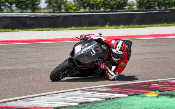 Ducati Panigale V2 motorcycle racing on track - HD wallpaper for desktop and background
