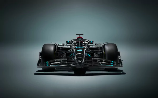 HD desktop wallpaper featuring a front view of the Mercedes W14 Formula 1 car, centered against a smooth gradient gray background.