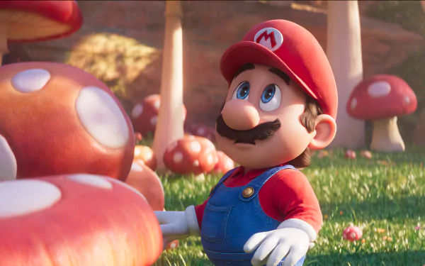 HD desktop wallpaper from the Super Mario Bros. (2023) movie featuring a 3D animated Mario in a mushroom-filled field.