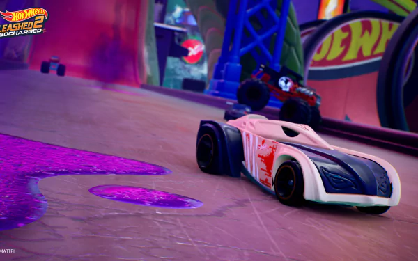 HD desktop wallpaper from Hot Wheels Unleashed 2: Turbocharged, featuring dynamic toy cars racing on a vibrant track.