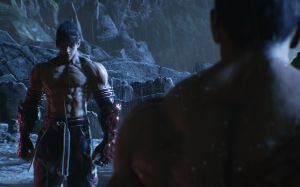 HD wallpaper of Jin Kazama from Tekken 8 with a dramatic pose in a cave environment, great for desktop background.