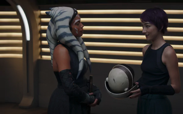 HD wallpaper of Ahsoka Tano and Sabine Wren, characters from the Star Wars universe, engaging in a dialog.