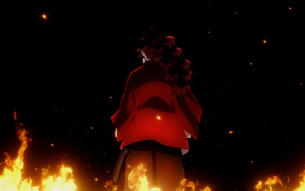 HD anime desktop wallpaper featuring a character from Demon Slayer: Kimetsu no Yaiba standing amidst flames against a dark background.