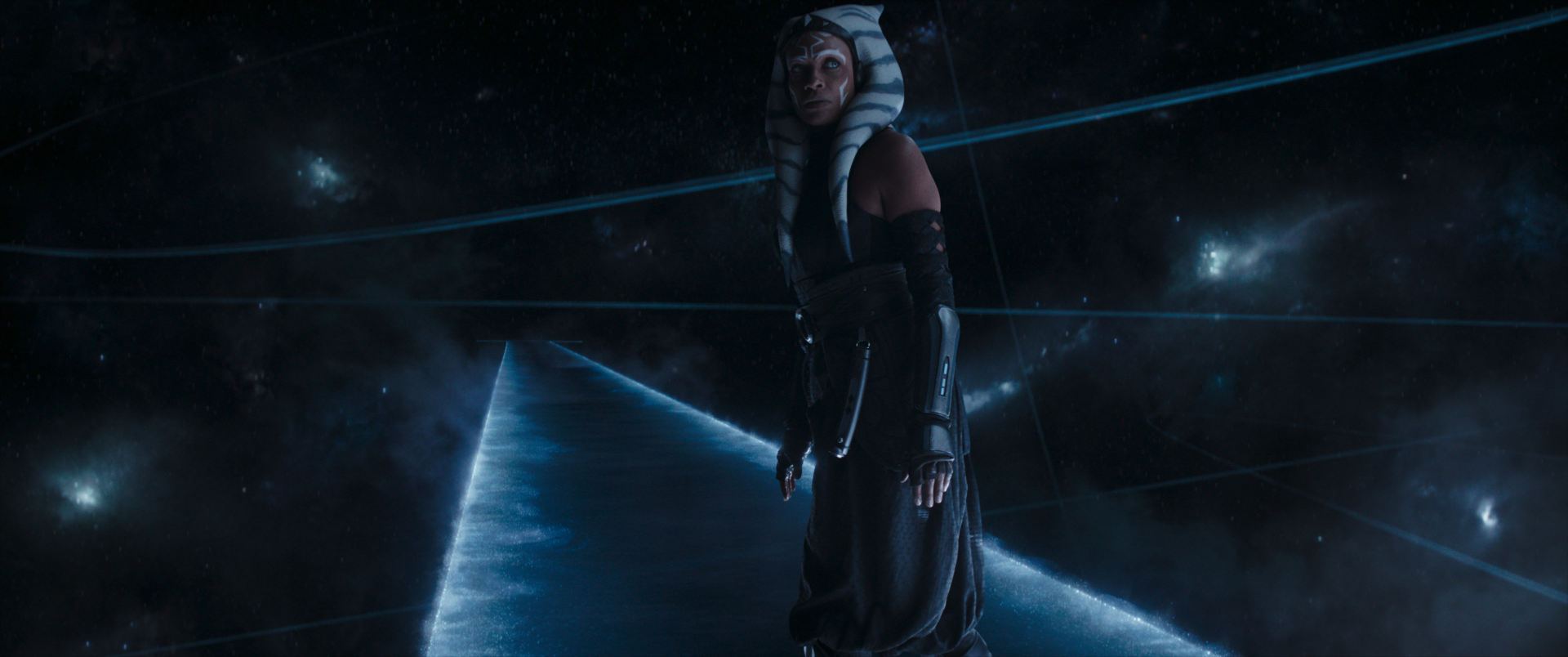 HD desktop wallpaper featuring Ahsoka on a starry spacewalk bridge, radiating a contemplative ambiance.