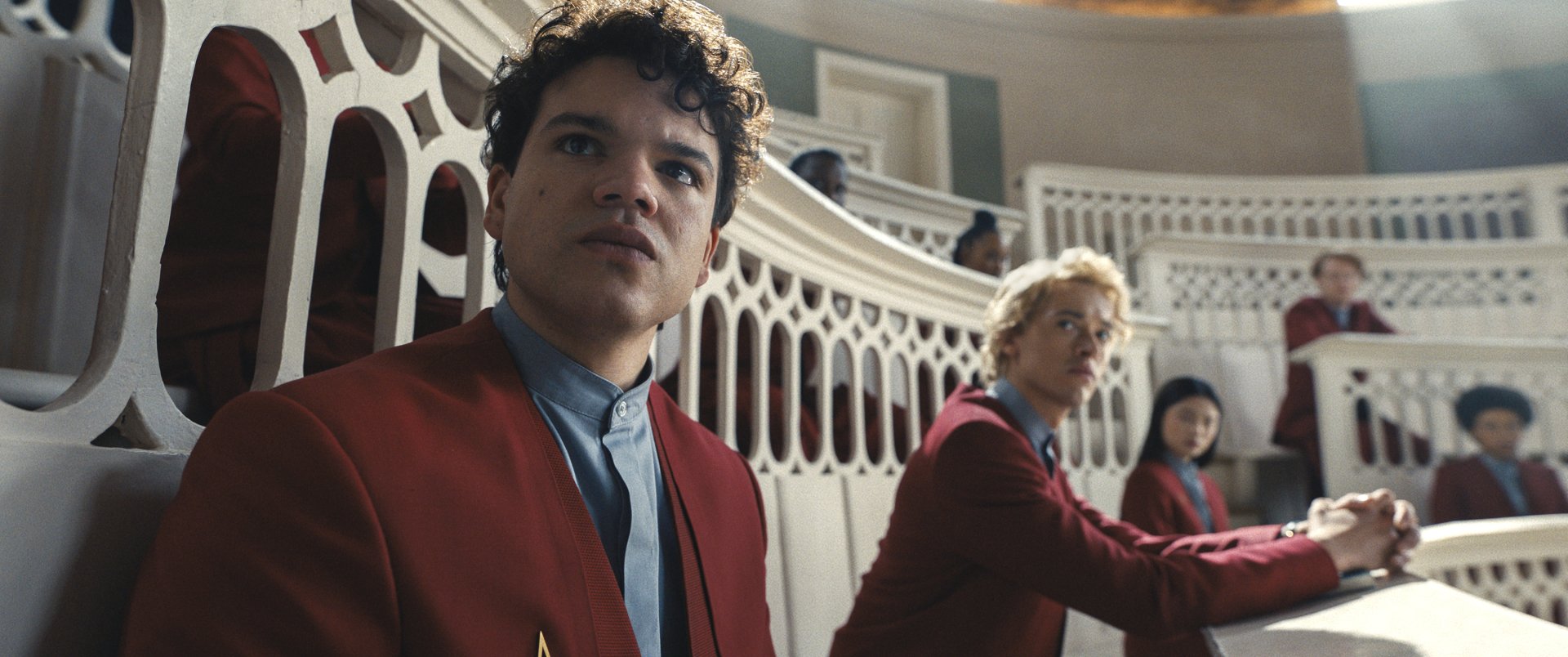 HD wallpaper featuring a scene from The Hunger Games: The Ballad of Songbirds & Snakes with characters in a richly decorated interior, creating an engaging background for fans of the series.