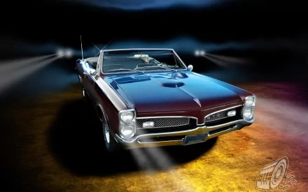 HD PC desktop wallpaper featuring a classic Pontiac GTO convertible with headlights on, set against a dark, smoky background.
