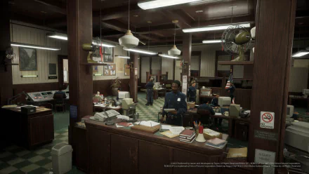 An HD desktop wallpaper from the video game RoboCop: Rogue City, featuring a detailed police station interior with officers at work and a vintage aesthetic.