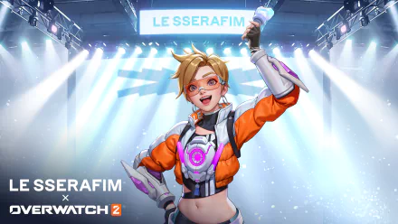 HD desktop wallpaper featuring Tracer from Overwatch 2 with vibrant stage lights in the background.