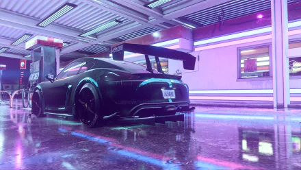 HD PC desktop wallpaper featuring a sleek, black sports car from the Need for Speed Heat game, showcasing vibrant neon lighting in a futuristic garage setting.