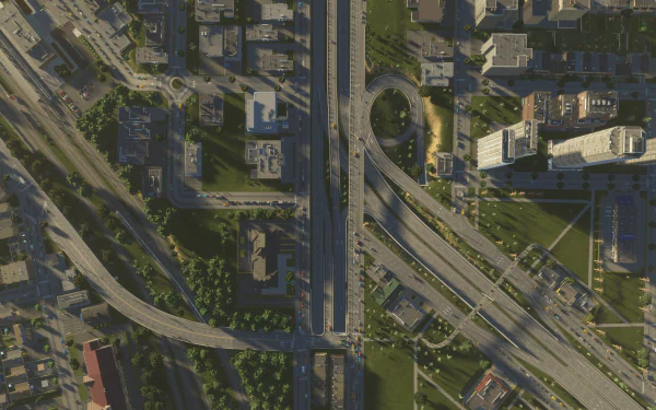High-definition desktop wallpaper featuring an intricate cityscape from Cities: Skylines II with detailed roadways and urban buildings.