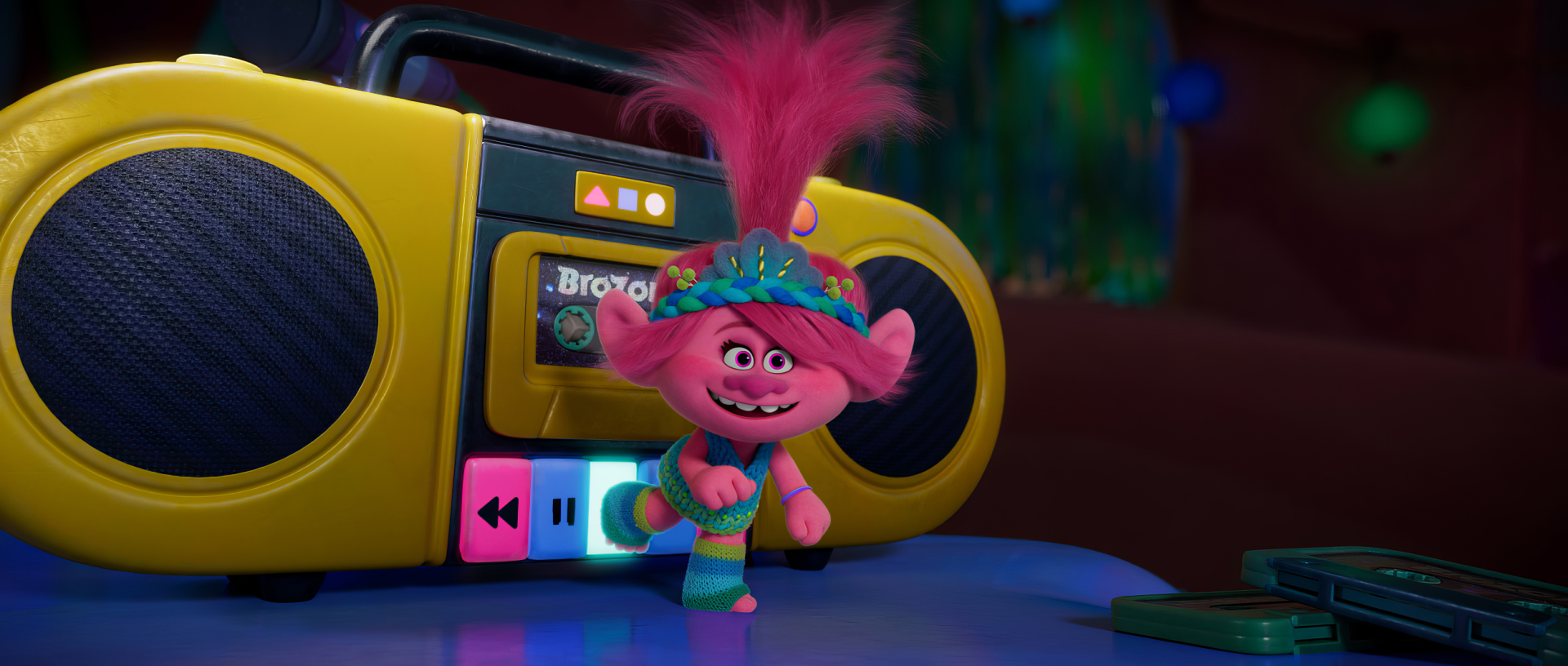 HD desktop wallpaper featuring a Trolls character with vibrant pink hair, standing next to a boombox, embodying the theme 'Trolls Band Together'.