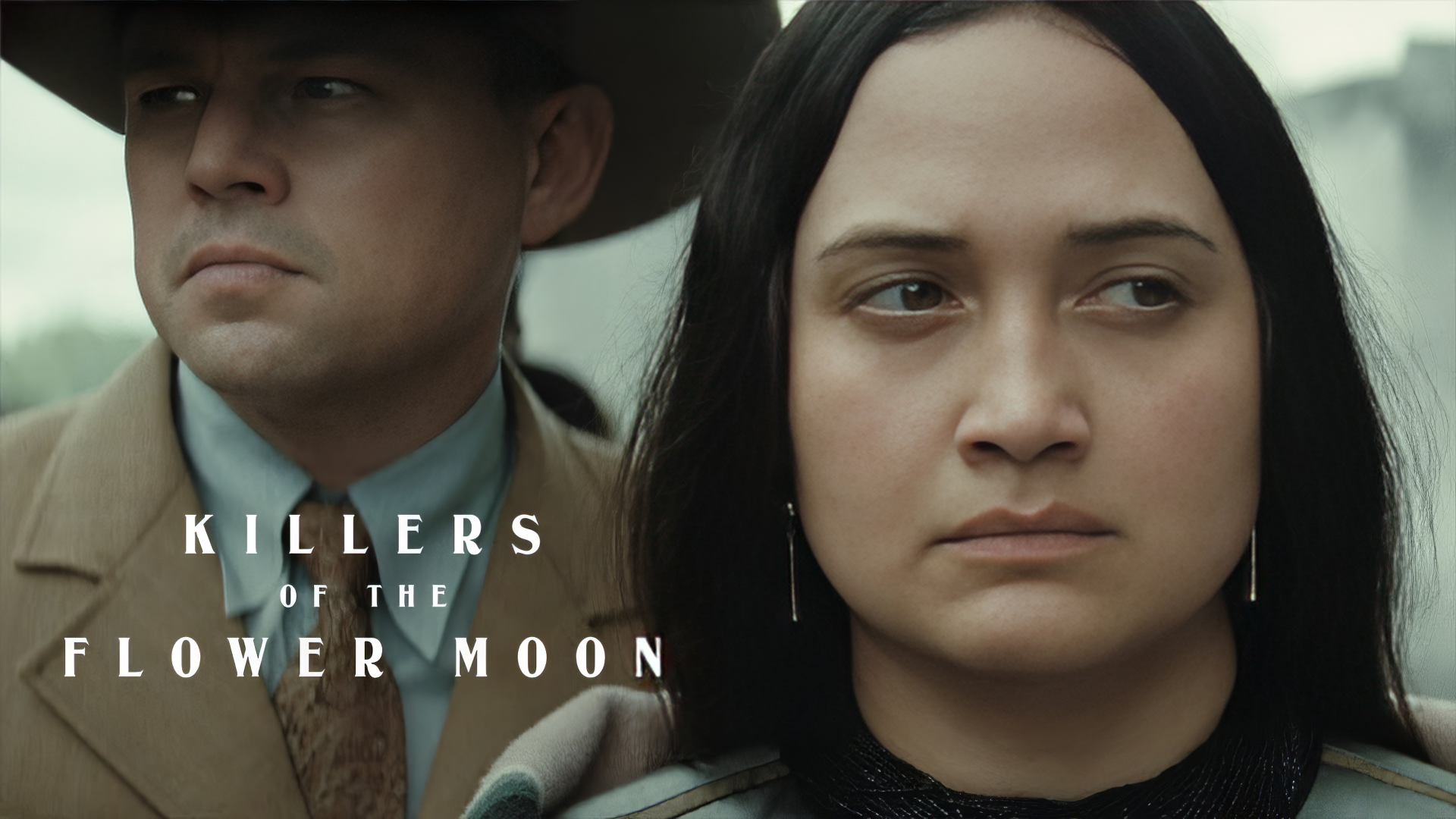 HD Wallpaper featuring a stoic man and woman from Killers of the Flower Moon movie for desktop background.