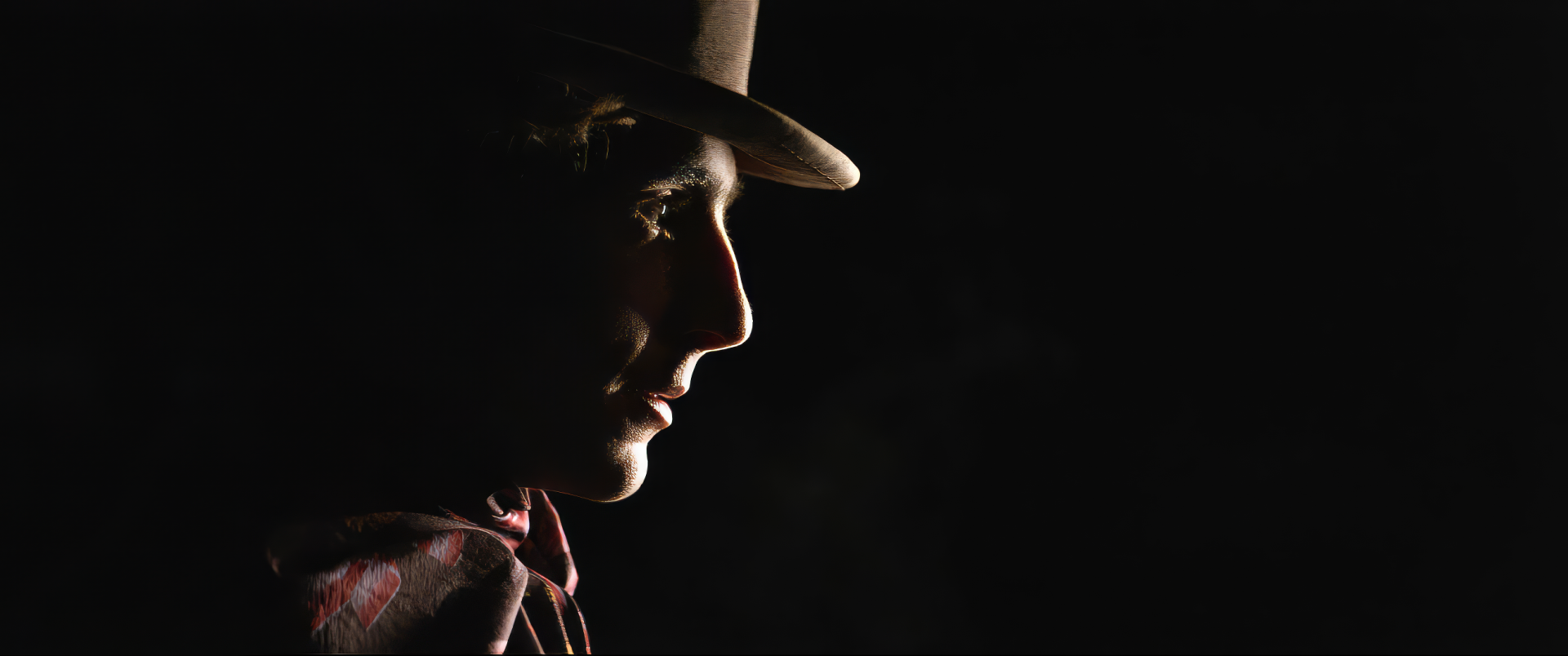 Silhouette of a man in a hat reminiscent of Wonka character, HD movie-themed desktop wallpaper.