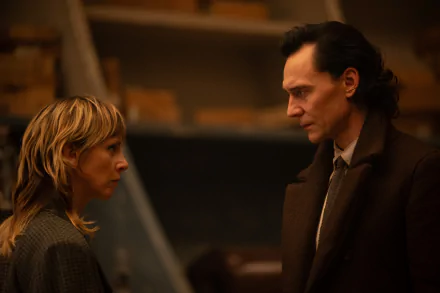 HD wallpaper featuring two characters in a deep conversation, evoking the ambiance of the Loki series, with the male character resembling actor Tom Hiddleston and the female character resembling actress Sophia Di Martino.